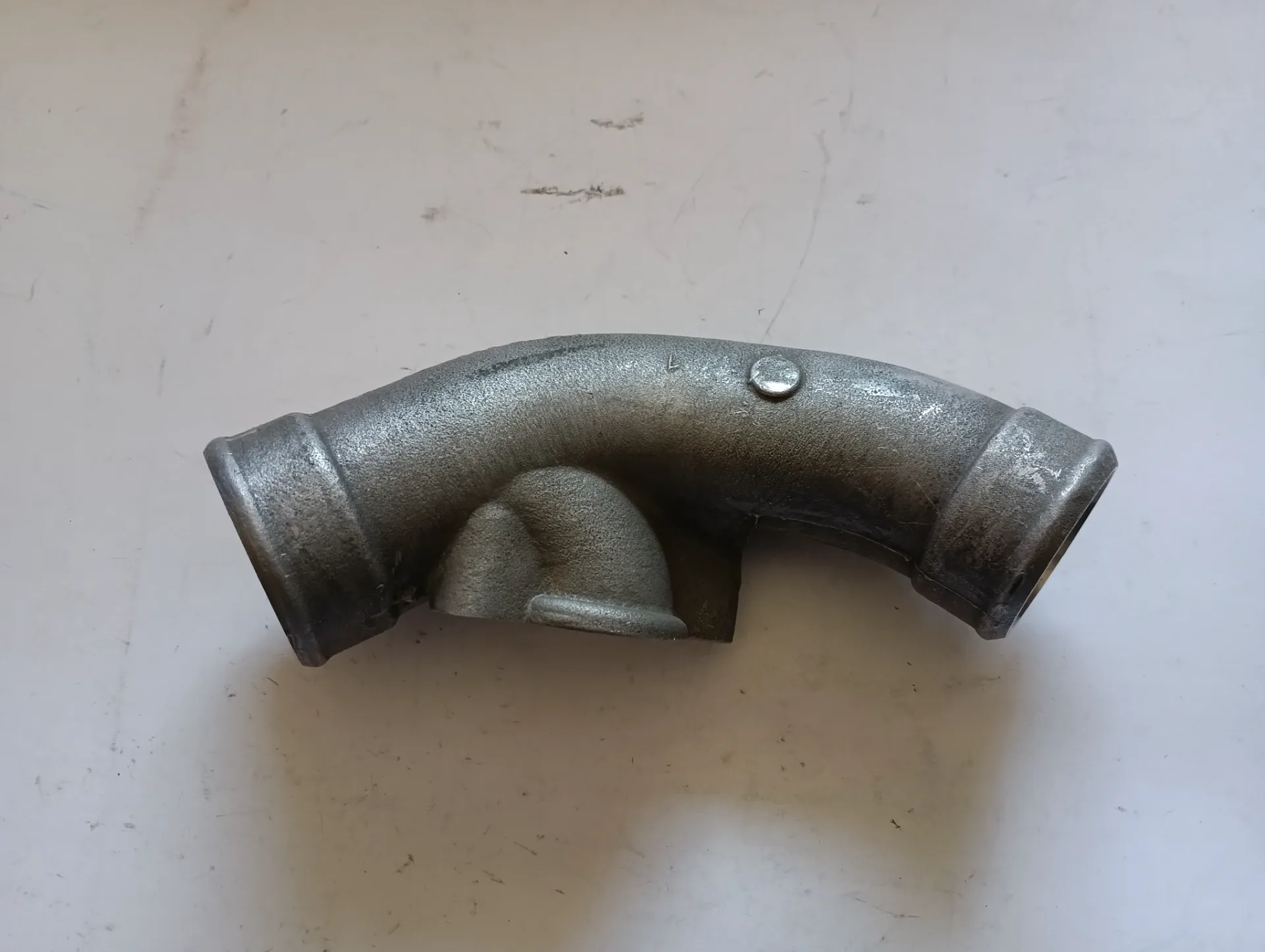 Патрубок ЗМЗ-514 выпускной ТКР